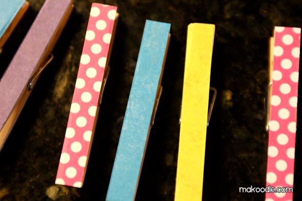 Clothespins covered in scrapbook paper